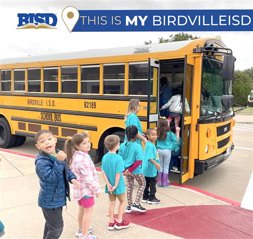 kids getting on bus