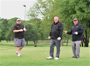 golfers on the course