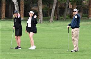 golfers waving