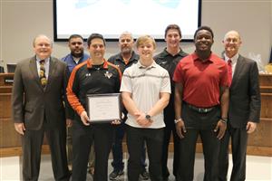 Jason Tucker and the Haltom High School football team were recognized for winning District 3-6A. 