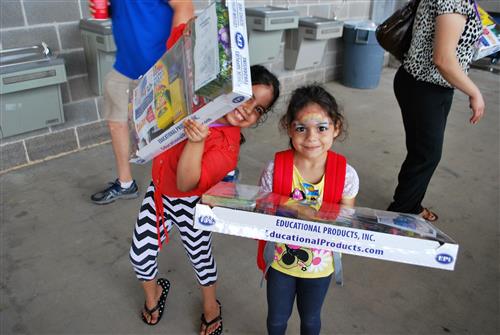 students with school supplies 