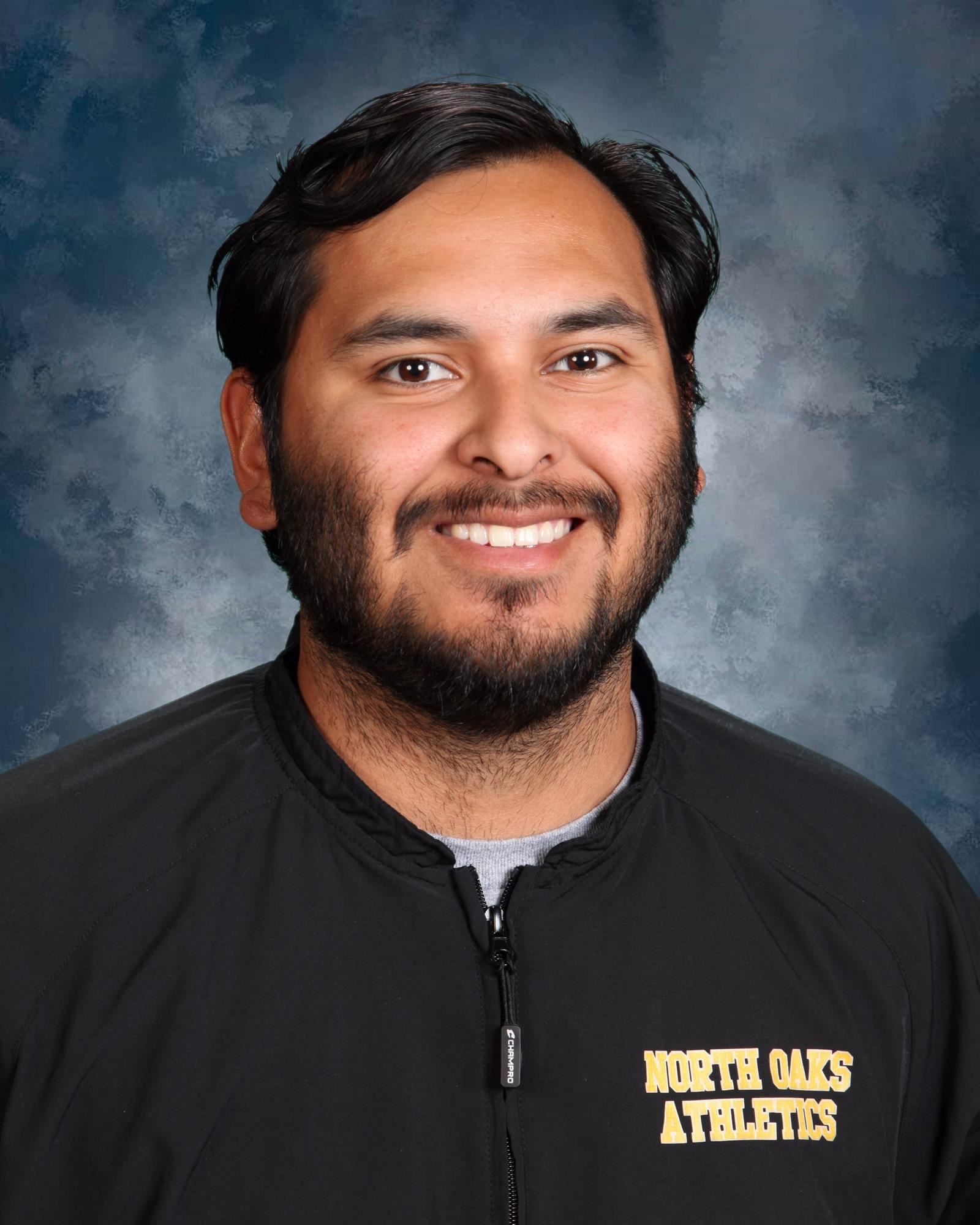 Coach Ricky Perez