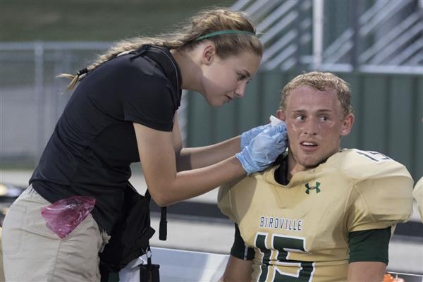 Student Athletic Trainer Aide at work